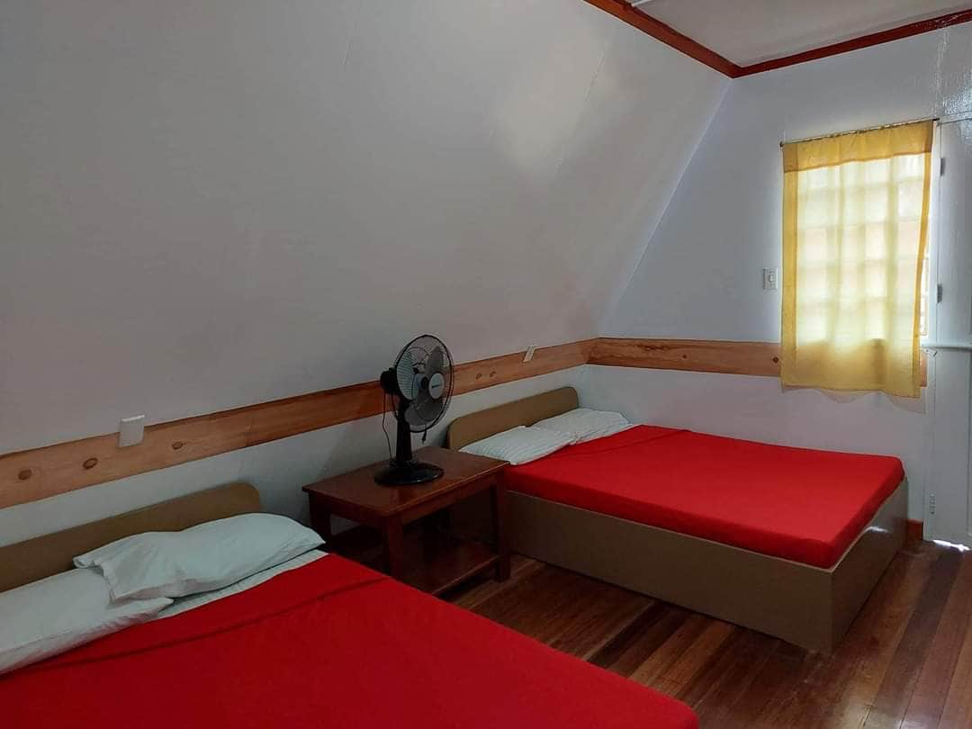 Twin loft bedroom — full-length view